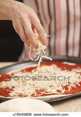 Woman preparing pizza View Large Photo Image Stock Photo - Woman preparing pizza. Fotosearch