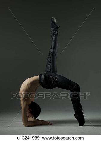 Young ballet dancer, studio shot View Large Photo Image Stock Photo - Young ballet dancer, studio shot. Fotosearch