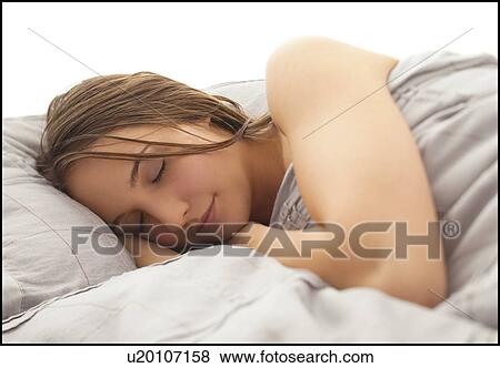 Young woman sleeping View Large Photo Image Stock Photo - Young woman sleeping. Fotosearch
