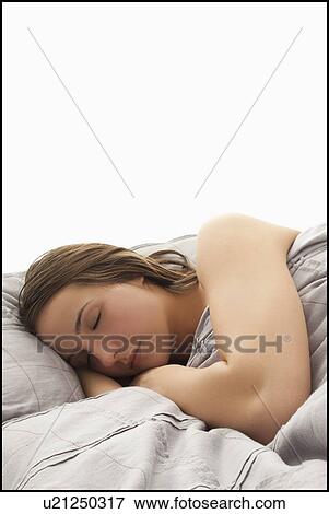 Stock Photo - Young woman sleeping. Fotosearch