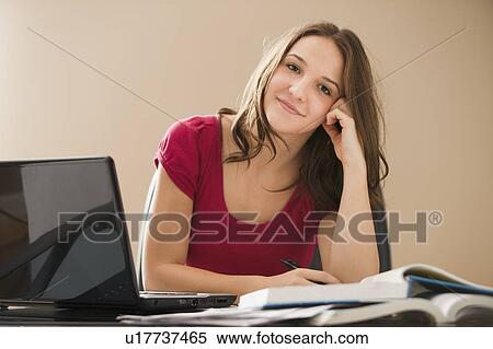 Young woman studying View Large Photo Image Stock Photography - Young woman studying. Fotosearch
