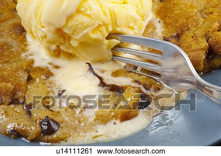 A Fork Cutting Into A Cookie With Ice Cream View Large Photo Image Stock Image - A Fork Cutting Into A Cookie With Ice Cream. Fotosearch