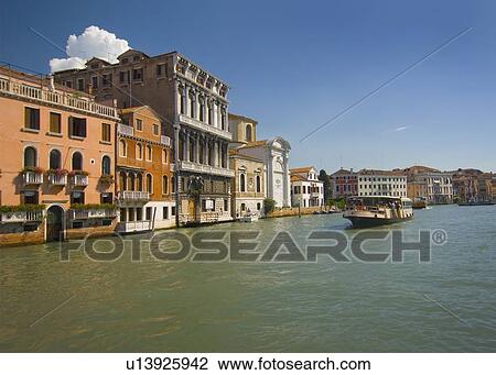 buildings along the water and a boat in the canal; venice, italy View Large Photo Image Stock Image - buildings along the water and a boat in the canal; venice, italy. Fotosearch