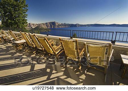 Stock Photo - lounge chairs overlooking crater lake; oregon, united states of america. Fotosearch