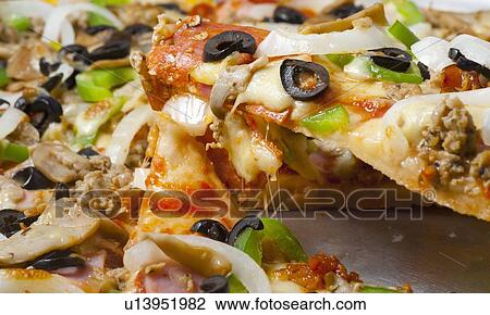 Pizza With A Variety Of Toppings View Large Photo Image Stock Image - Pizza With A Variety Of Toppings. Fotosearch