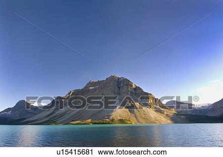 view of mountains, glaciers and bow lake along highway 93 between banff and jasper; alberta, canada View Large Photo Image Stock Image - view of mountains, glaciers and bow lake along highway 93 between banff and jasper; alberta, canada. Fotosearch