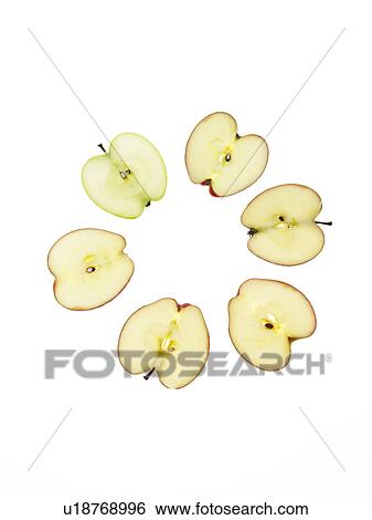 Apple slices on white background View Large Photo Image Stock Photograph - Apple slices on white background. Fotosearch