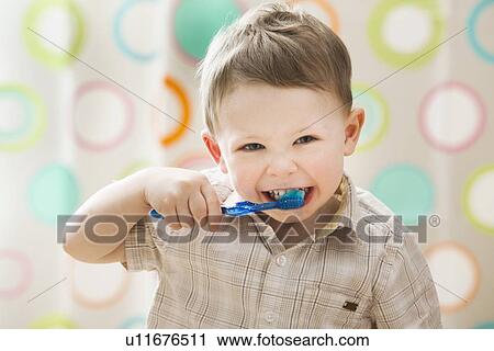 Boy (2-3) brushing teeth View Large Photo Image Stock Image - Boy (2-3) brushing teeth. Fotosearch