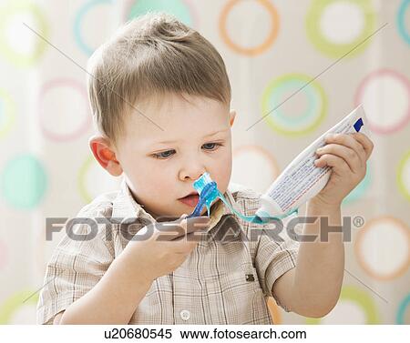 Boy (2-3) brushing teeth View Large Photo Image Stock Photography - Boy (2-3) brushing teeth. Fotosearch