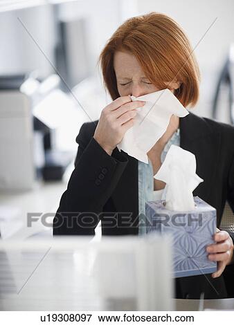 Businesswoman blowing nose View Large Photo Image Stock Photo - Businesswoman blowing nose. Fotosearch