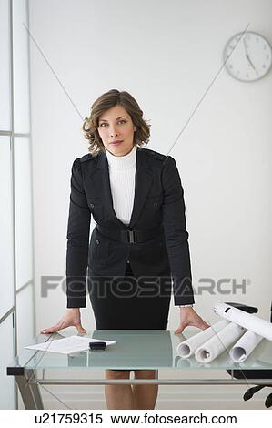 Stock Photography - Businesswoman in office. Fotosearch