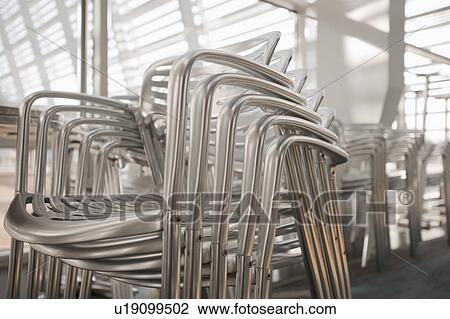 Stock Image - Businesswoman text-messaging. Fotosearch