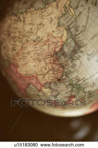 Stock Image - Close-up of antique globe. Fotosearch