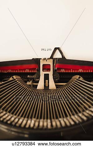 Close up of antique typewriter with "the end" print on page View Large Photo Image Picture - Close up of antique typewriter with "the end" print on page. Fotosearch
