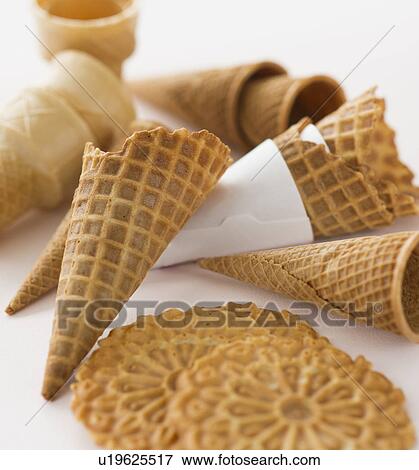 Close up of empty ice cream cones and wafers View Large Photo Image Stock Photo - Close up of empty ice cream cones and wafers. Fotosearch