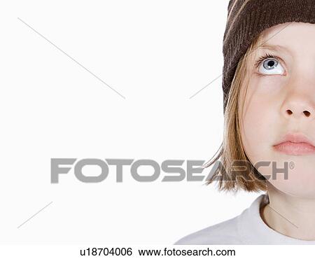 Close-up of girl (6-7) looking up View Large Photo Image Stock Photograph - Close-up of girl (6-7) looking up. Fotosearch