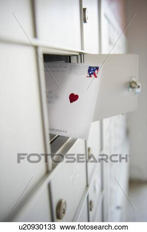 Close up of letter in mailbox View Large Photo Image Stock Image - Close up of letter in mailbox. Fotosearch