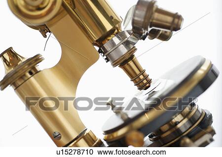 Stock Image - Close up of microscope. Fotosearch