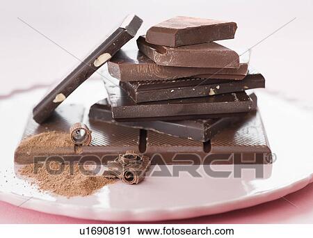 Close up of pieces of chocolate bars View Large Photo Image Stock Image - Close up of pieces of chocolate bars. Fotosearch