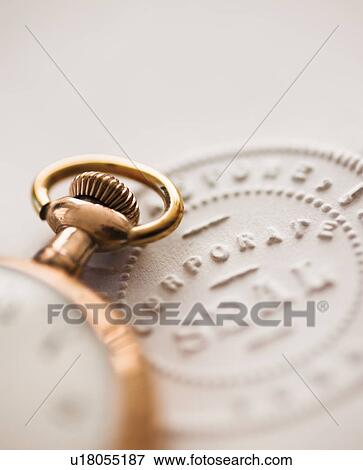 Close up of pocket watch and corporate seal View Large Photo Image Stock Photo - Close up of pocket watch and corporate seal. Fotosearch