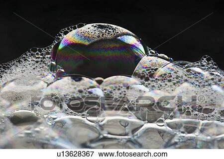 Stock Photo - Close up of soap bubbles. Fotosearch