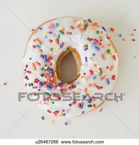 Stock Photograph - Close-up of sprinkled donut. Fotosearch