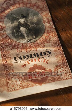 Stock Image - Close up of stock certificate. Fotosearch