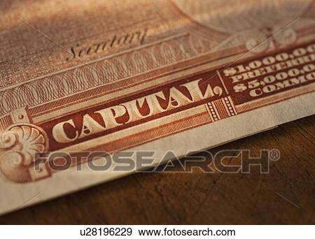 Stock Photo - Close up of stock certificate. Fotosearch