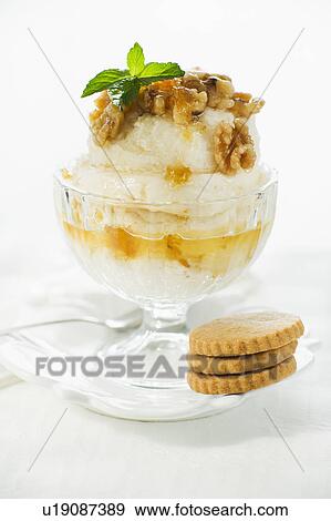Stock Photo - Close up of sundae and cookies. Fotosearch