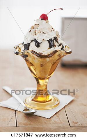 Close up of sundae with cherry on top View Large Photo Image Stock Photo - Close up of sundae with cherry on top. Fotosearch