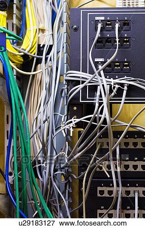 Stock Photo - Close-up of tangled computer cables. Fotosearch