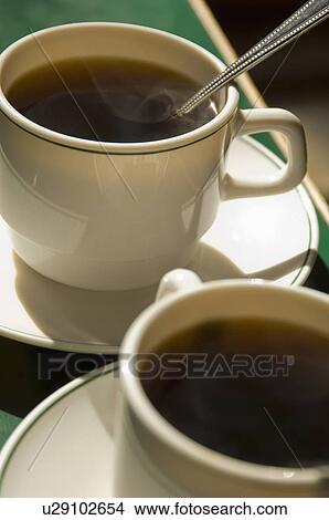 Close up of two coffee cups View Large Photo Image Picture - Close up of two coffee cups. Fotosearch