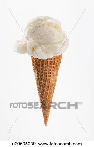 Stock Photo - Close up of vanilla ice cream cone. Fotosearch