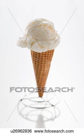 Stock Photograph - Close up of vanilla ice cream cone. Fotosearch