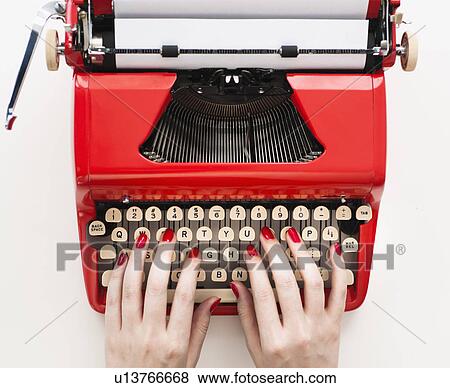 Close up of woman's hands with red nail polish typing on antique typewriter View Large Photo Image Stock Photo - Close up of woman's hands with red nail polish typing on antique typewriter. Fotosearch