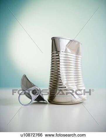 Stock Photograph - Damaged tin can. Fotosearch