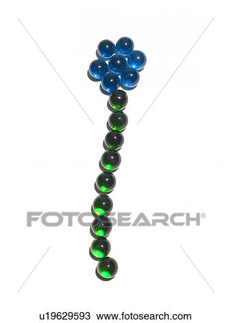 Stock Image - Flower arranged of blue and glass balls. Fotosearch