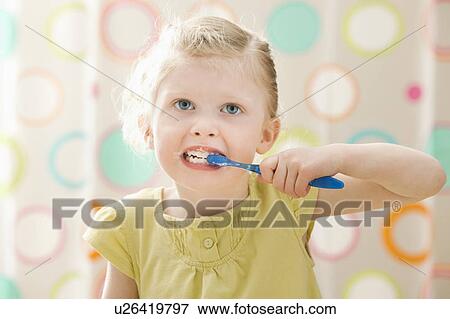 Girl (2-3) brushing teeth View Large Photo Image Stock Photo - Girl (2-3) brushing teeth. Fotosearch