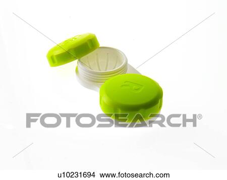 Picture - Green contact lens cases on white background. Fotosearch
