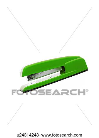 Stock Photo - Green stapler on white background. Fotosearch