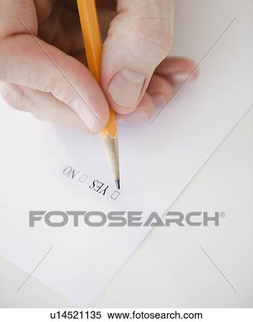Stock Photography - Hand filling document. Fotosearch