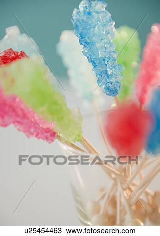 Stock Image - Hard rock candies in glass. Fotosearch