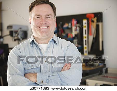 Stock Image - Hardware store owner. Fotosearch