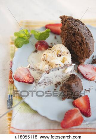 Stock Photo - Ice cream with strawberries. Fotosearch