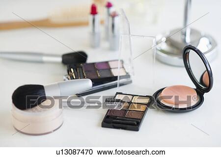 Stock Image - Make-up cosmetics on table. Fotosearch