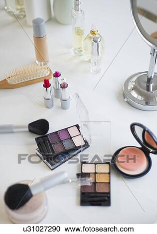 Make-up cosmetics on table View Large Photo Image Stock Image - Make-up cosmetics on table. Fotosearch