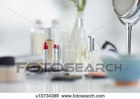 Stock Photo - Make-up cosmetics on table. Fotosearch