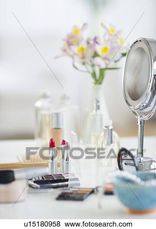 Stock Photo - Make-up cosmetics on table. Fotosearch