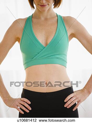 Mid-section of slim woman View Large Photo Image Stock Image - Mid-section of slim woman. Fotosearch