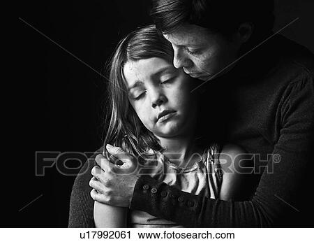 Mother and daughter (6-7) embracing View Large Photo Image Stock Image - Mother and daughter (6-7) embracing. Fotosearch